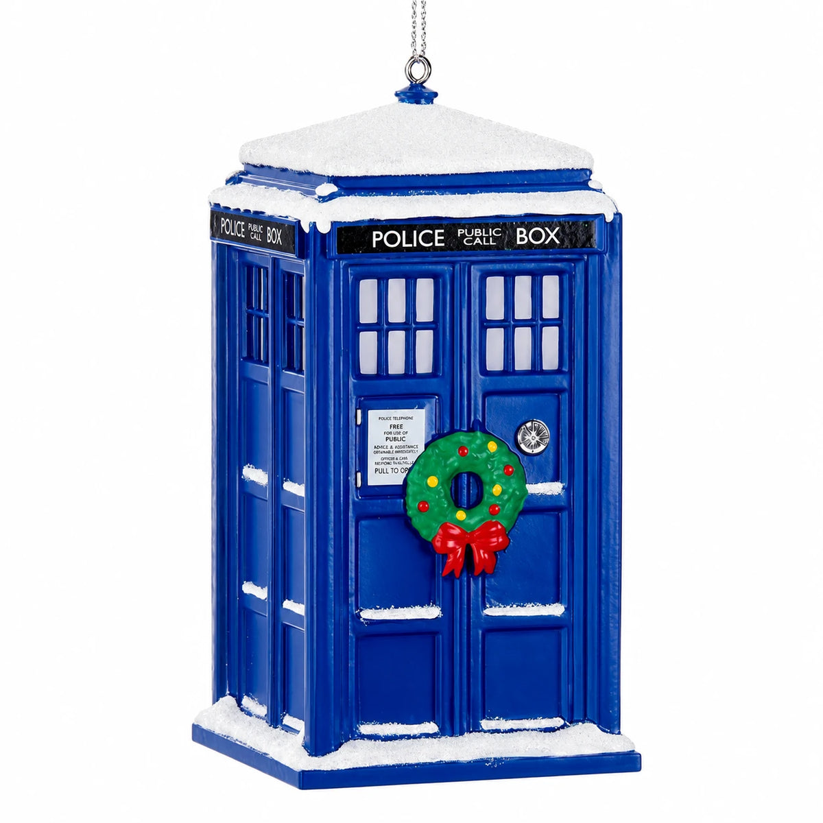 Blue Police Public Call Box With Green Christmas Wreath on the Front Door and snow all on the top and the base of the Ornament